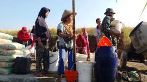 Tongkat Pengambil Air