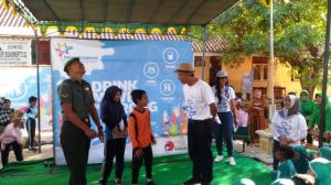 PT Kievit Indonesia dan Satgas TMMD Ajak Siswa-Siswi di Bononerto Minum Susu Bersama      