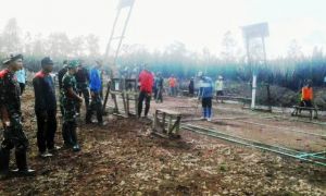 Salurkan Hobi Berolahraga Warga, Satgas TMMD Bangun Lapangan Bukutangkis
