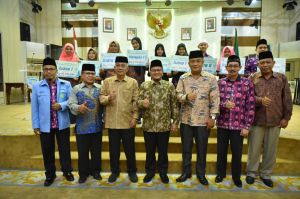 Apresiasi Pejuang Al-Quran, Pemkot Jambi Kembali Serahkan Bonus MTQ dan FASI Kota Jambi