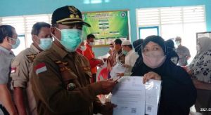 Mashuri Dampingi Ketua DPRD Edi Purwanto Pantau Penyaluran BST dan PKH di Merangin