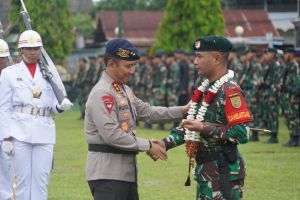 Korem 042/Gapu Gelar Upacara Penyambutan Satgas Yonif Raider 142/KJ dan Pengukuhan Keluarga Asuh TNI