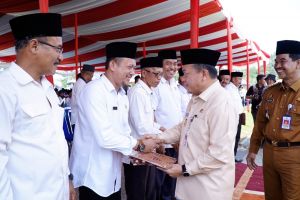 Al Haris Hadiri Pengukuhan Masa Jabatan BPD dan Peringatan HAN di Muaro Jambi