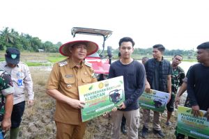 Bupati BBS Hadiri Swasembada Panggan Nasional  Tanam Padi Serentak di Jambi